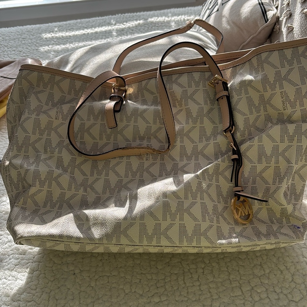 Michael Kors cream monogram neverfull bag